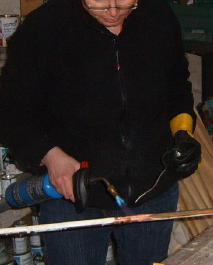Soldering two lengths of copper pipe together using a straight connector