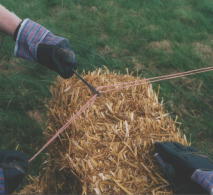 Baling needle: this home-made tool allows you to cut and re-bind bales to any size necessary to fit a gap or a corner