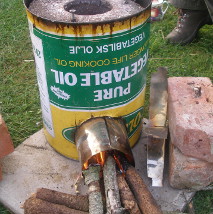 simple rocket stove made from two cans