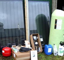 an entire solar hot water kit, comprising panels, twin-coil cylinder, pump & control set, expansion vessel, air release set, filling bottle, anti-freeze, high-temperature pipe insulation and manual