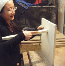 Test-assembling the underframe of a small dovetailed table