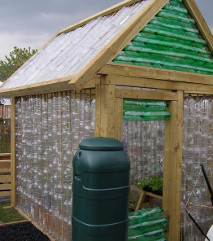 how about this self-built greenhouse from hundreds of recycled plastic bottles?