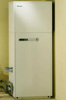 the pump unit sits in a corner of your house, impersonating a fridge