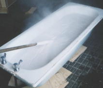 Quicklime being slaked in an old bath