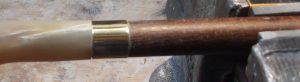 A stick with fitted collar
