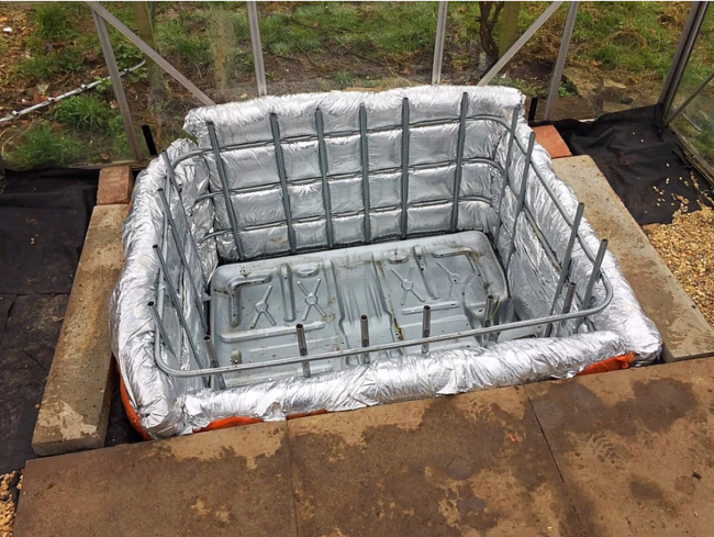 Insulating the tanks in the aquaponics greenhouse