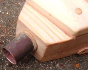 Nozzle fitted in place with leather seal