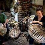 Ruby and Owen making an oak swill basket