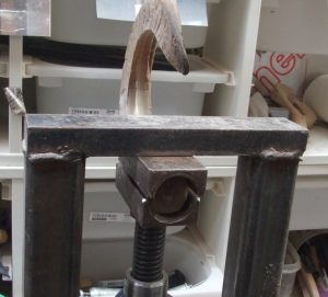 Forming the crook's neck using the metal shells