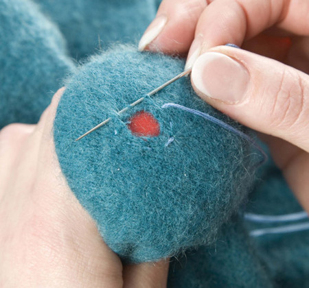 Make do and mend is another step to low-impact clothes darning-sock
