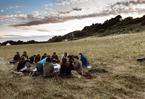 Gathered for a communal meal of foraged foods